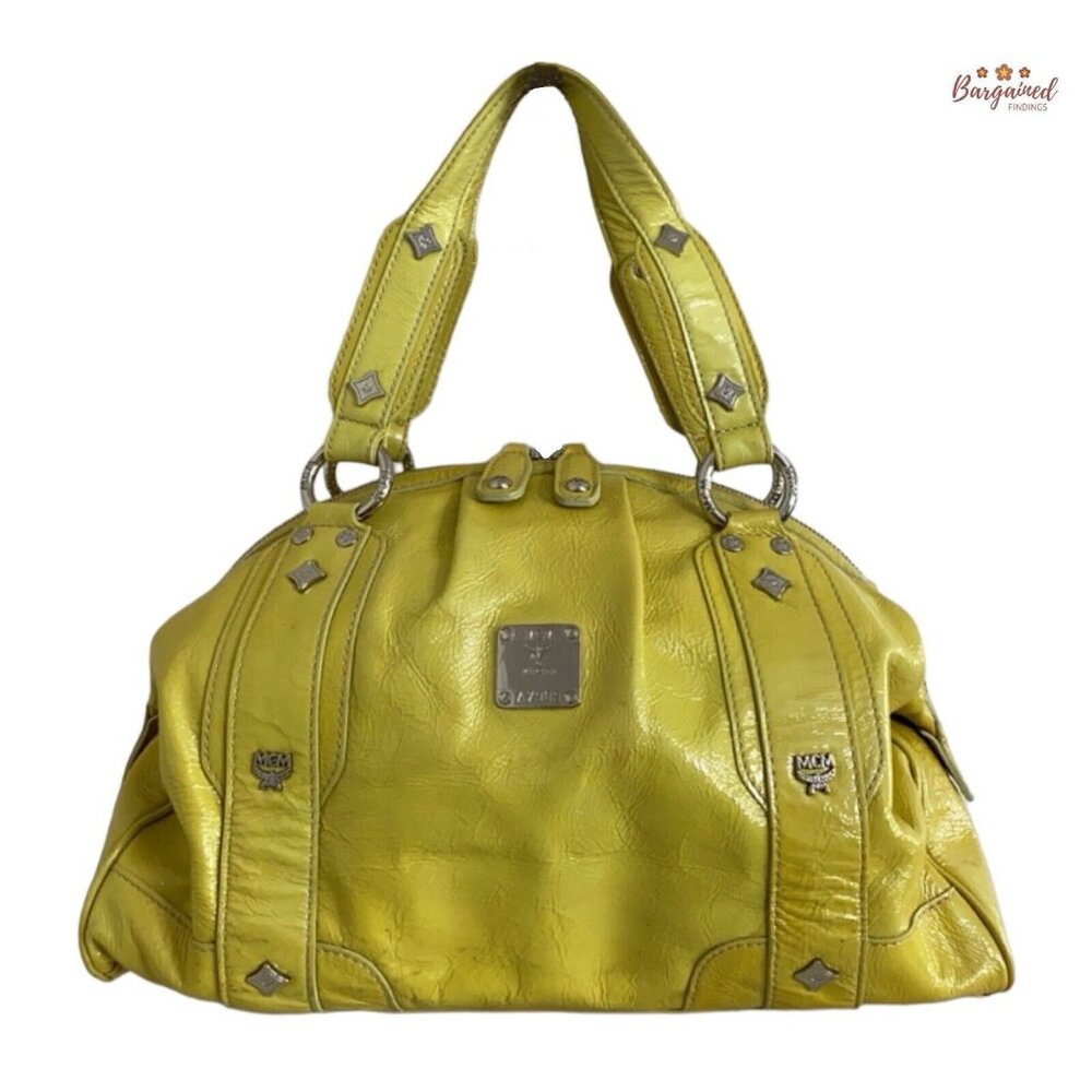 Authentic MCM Yellow Distressed Patent Leather Silver Studded Logo Motifs Bag